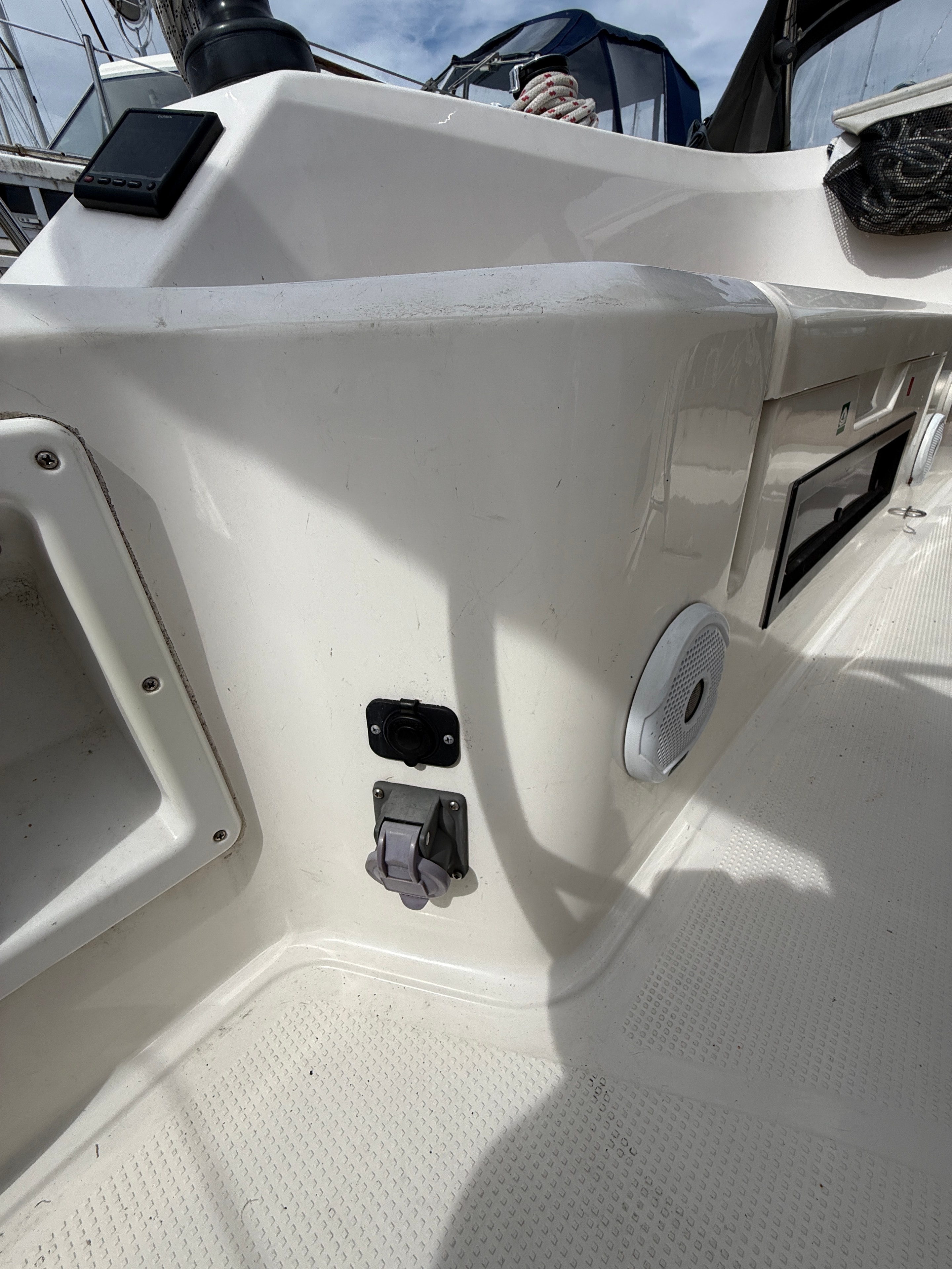 12V sockets and shore power outlet — cockpit coaming