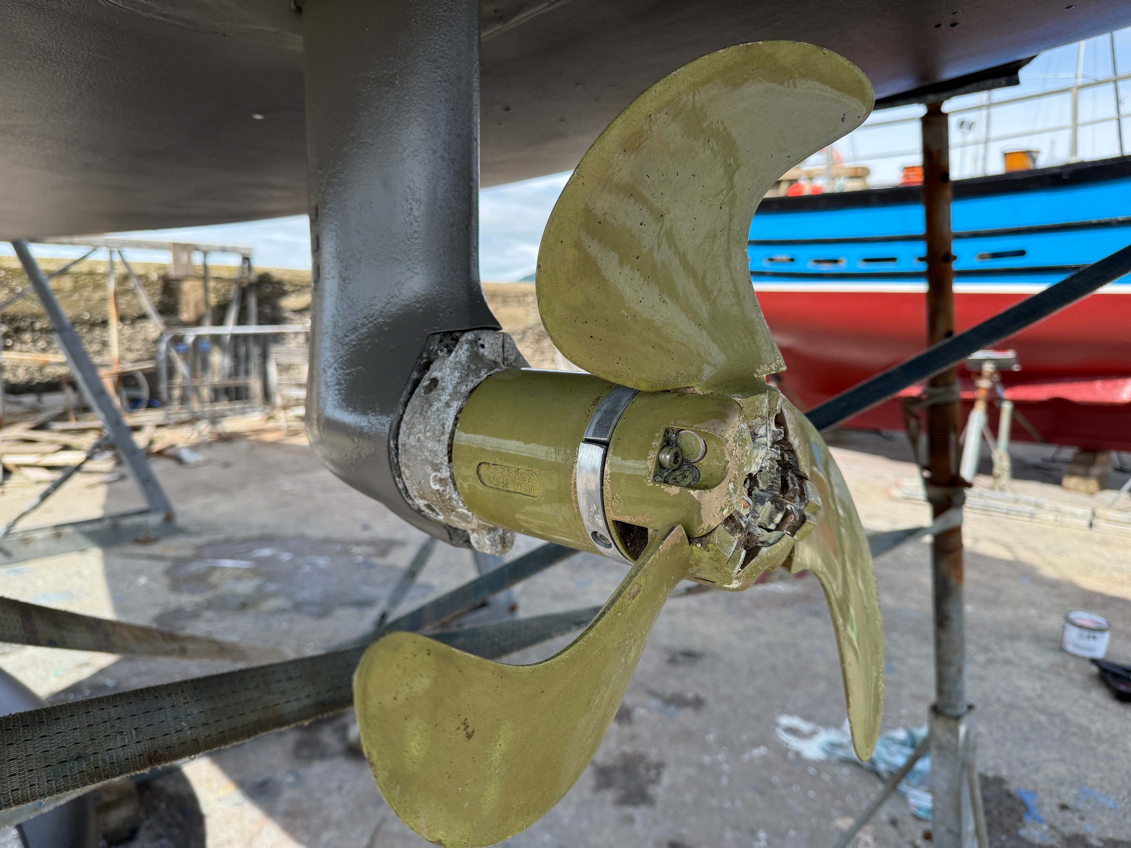 Propeller and shaft — three-blade bronze prop, cutlass bearing