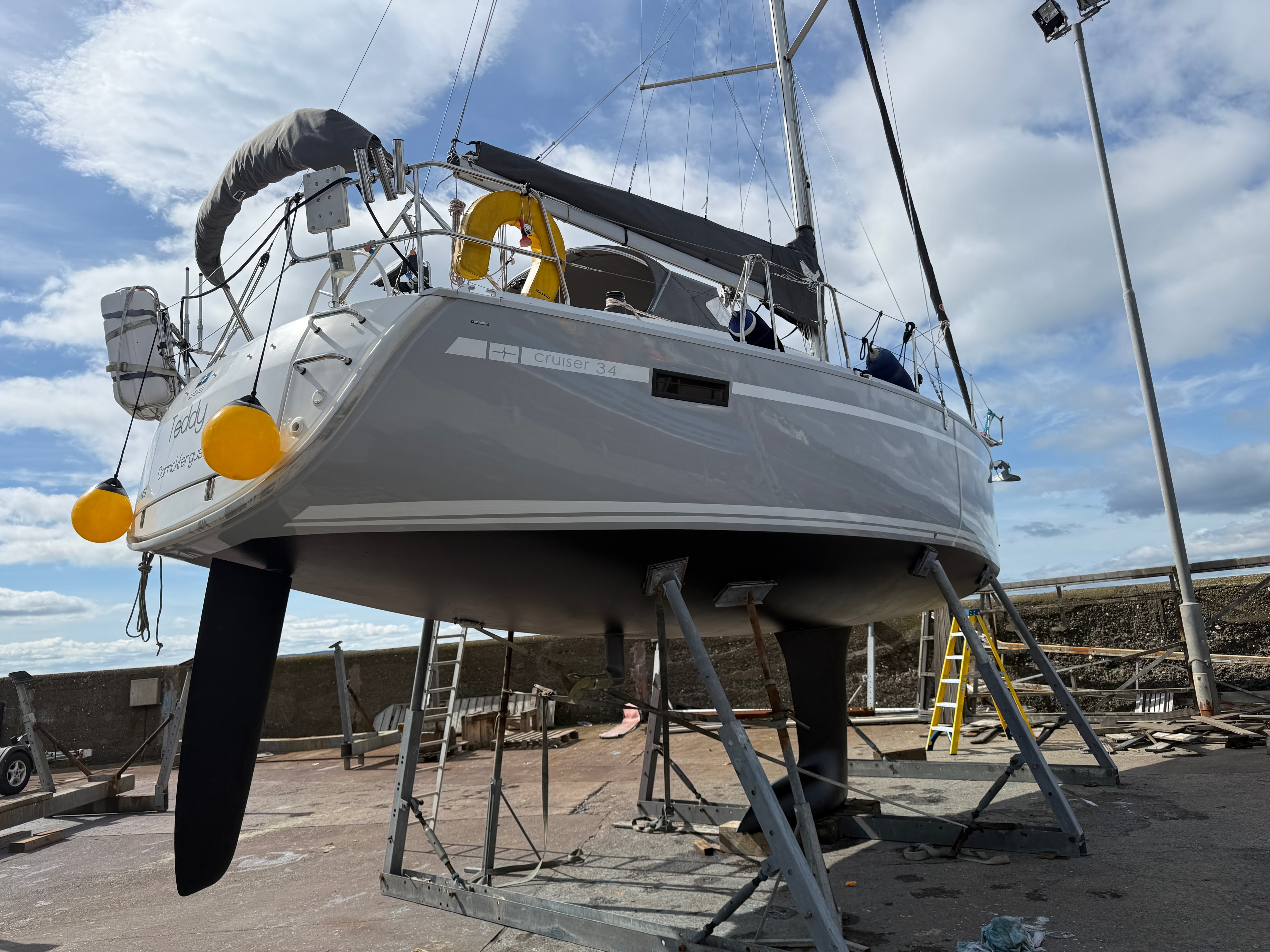 Teddy on the hard — stern quarter, keel and rudder, July 2026