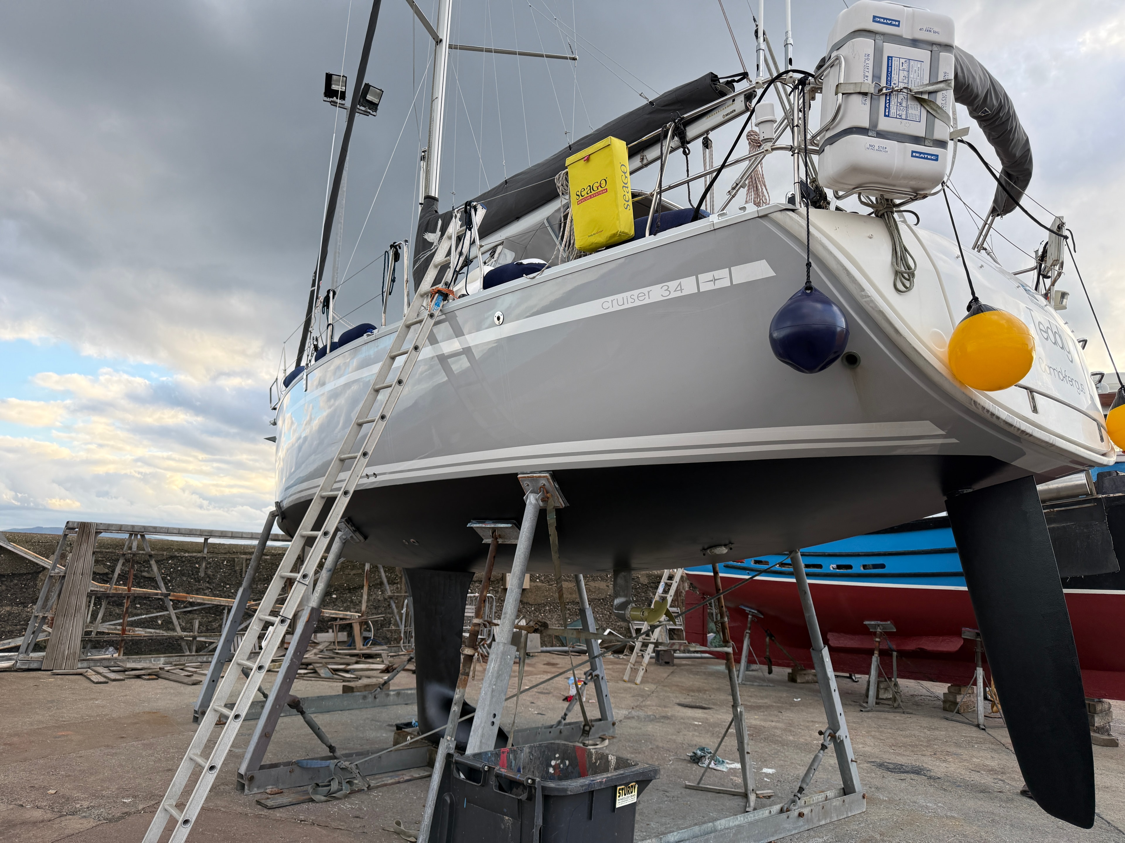 Teddy on the hard — port broadside, freshly antifouled, July 2026