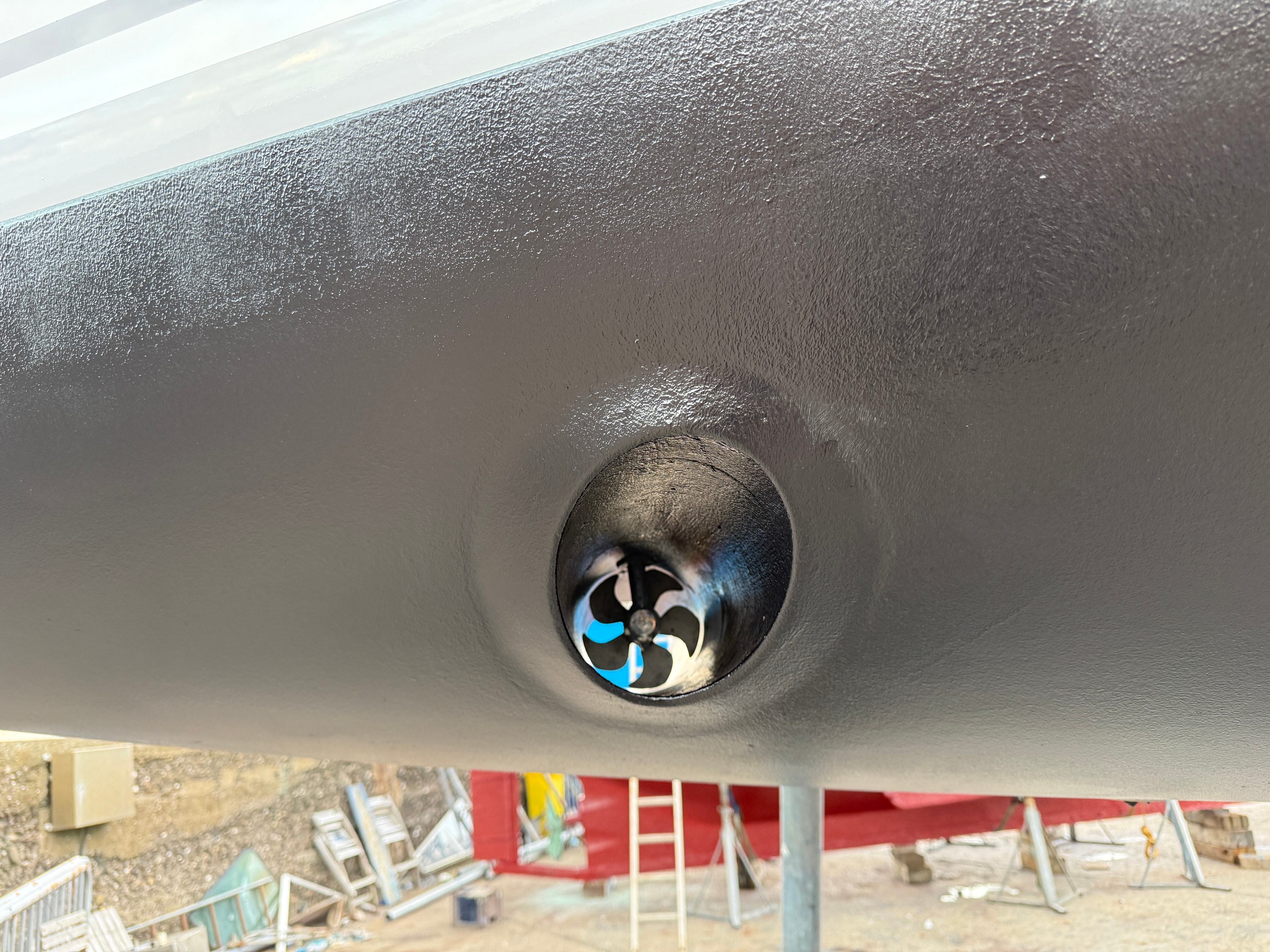 Bow thruster tunnel — Side-Power thruster blades, freshly antifouled hull
