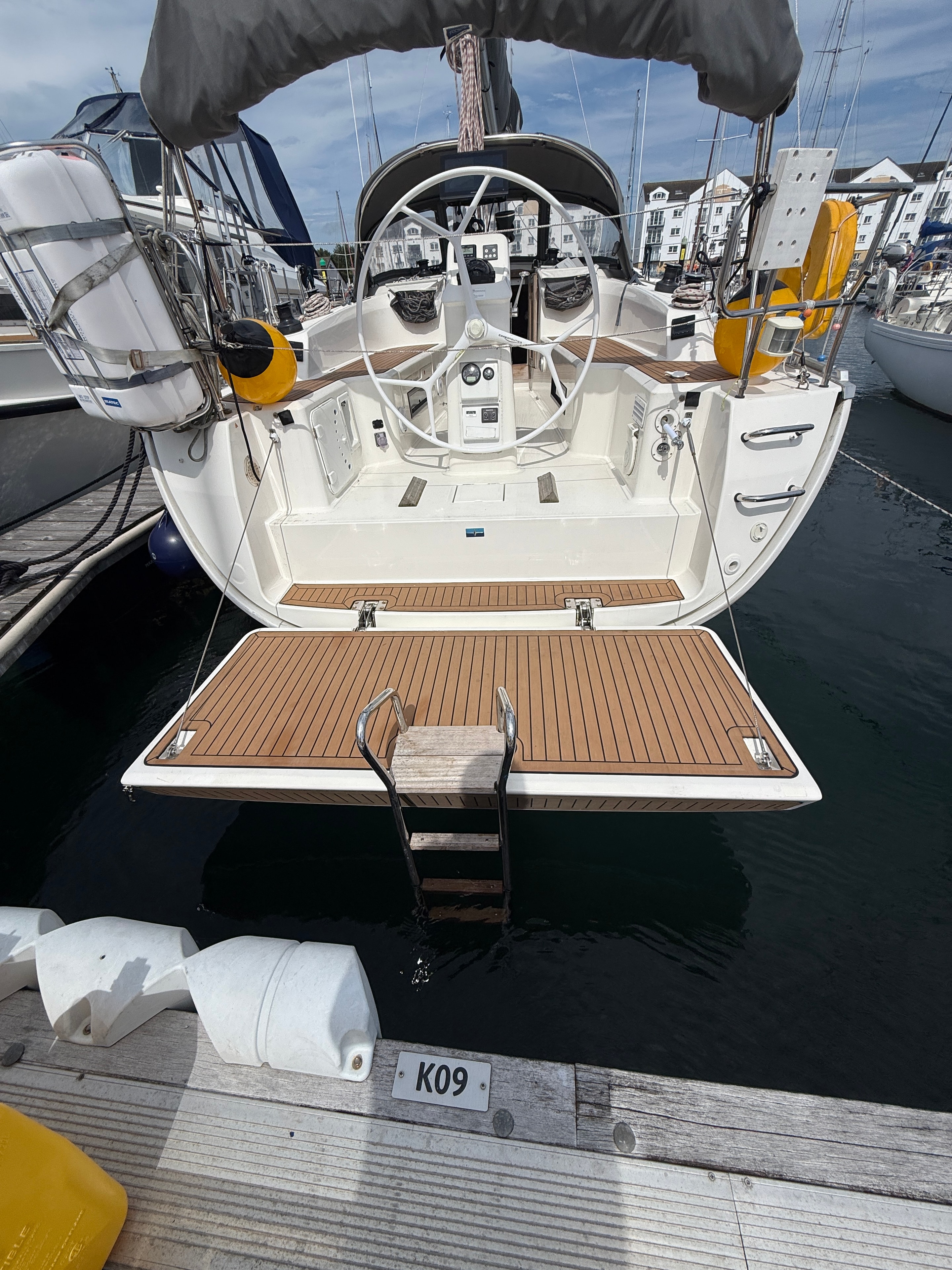 Swim platform open — teak and transom ladder
